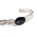bracciale rigido con cameo centrale con micro medusa inglobata sotto resina