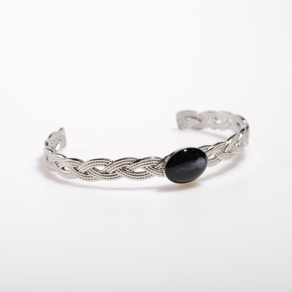 bracciale rigido intrecciato con ovale centrale con medusa marina inglobata sotto resina