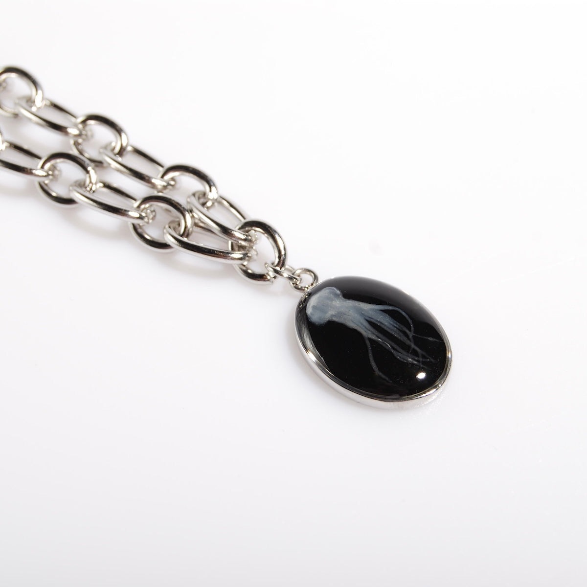 collana catena in acciaio con pendente medusa marina