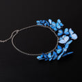 collana con sciame di farfalle blue morpho