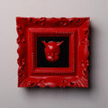 quadretto barocco rosso con testa di diavoletto rosso